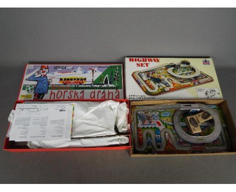 Kovar, Welby - Two boxed modern tinplate toy set. Lot consists of a Welby Highway Set; and a Kovar Bergban Mountain Railway. 