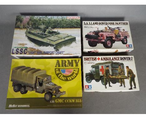 Heller, Tamiya, Dragon - Four boxed plastic military model kits in 1:35 scale. Lot includes Tamiya #76 SAS Land Rover Pink Pa