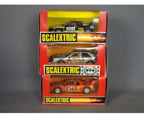 Scalextric - 3 x cars including Audi quattoro, Lancia 037 # 8348, BMW M1 # 8337 in Jagermeister livery. The cars all appear V
