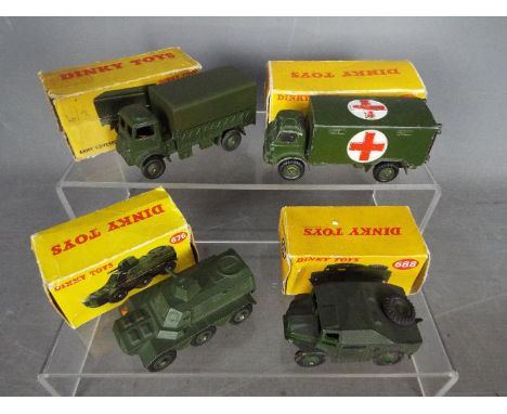 Dinky Toys - Four boxed diecast military vehicles from Dinky Toys. Lot includes #626 Military Aumbulance; #676 Armoured Perso