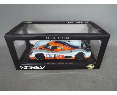 Norev - Lola Aston Martin LMP1 Le Mans in 1:18 scale in Gulf colours # 182760. The car appears Mint in a Very Good box with l