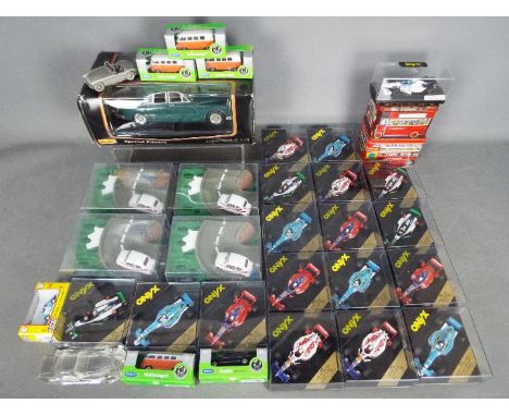 Onyx, Maisto, Welly, Other - A collection of boxed diecast model vehicles in various scales (mainly Onyx F1 cars) with a smal
