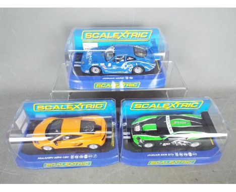 Scalextric -  three 1.32 scale Scalextric cars comprising Jaguar XKR GT3 #D3144, Jaguar XKRS #C2908 and McLaren MP4-12C #C320