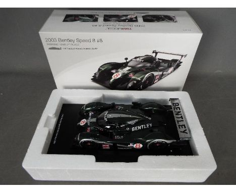 True Scale Miniatures - 2003 Bentley Speed 8 racing car in 1:18 scale in resin. The car appears Mint in a Very Good box with 