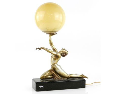 Art Deco figural lamp, a dancer holding a globe lampshade, silvered spelter, on polished slate base with Bakelite switch, the