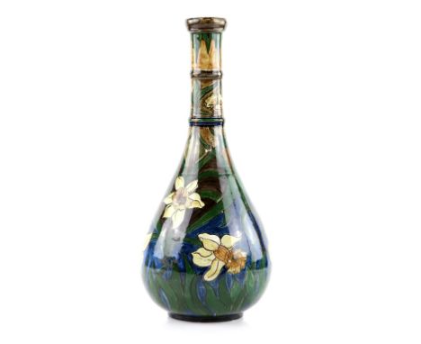 A Tall vase in the manner of Della Robbia Birkenhead,  with ringed neck and painting of narcissi within Art Nouveau pattern o