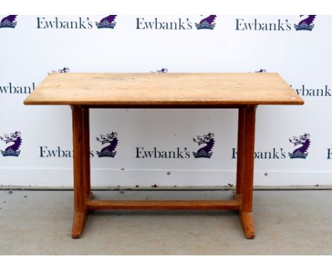 Gordon Russell a Cotswold School influence refectory dining table on chamfered octagonal form trestle supports with stretcher