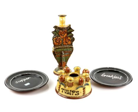 Mary Wondrausch, pottery, slipware decorated tulip vase, a candlestick and two plates ' breakfast and supper'  (4) .    