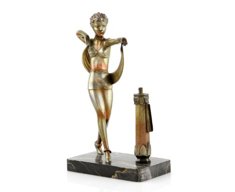 After Josef Lorenzl (1892-1950), an Art Deco silvered spelter figural table lighter formed as a scarf dancer on a variegated 
