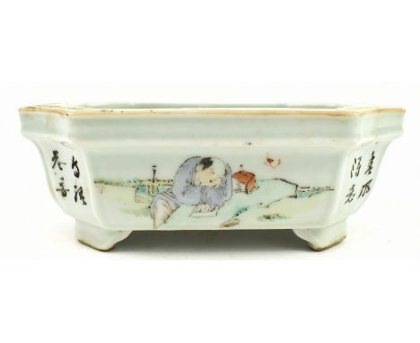 A Qing dynasty / early Republic period famille rose footed jardinere. The octagonal shaped jardiniere has a flat mouth rim, p