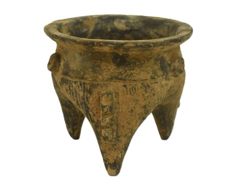 A Neolithic Xiajiadian culture 2000 BC pottery tripod vessel. This tripod vessel (Li) is divided into three lobes which taper
