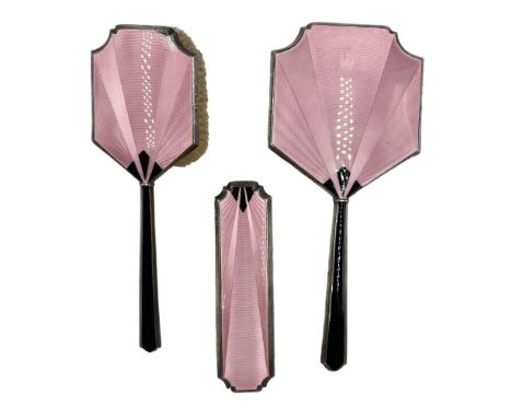 Art Deco pink and black guilloche enamel dressing table set, comprising hand mirror and two brushes, hallmarked A & J Zimmerm