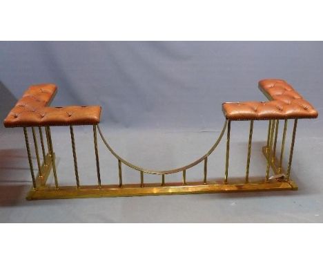 An early 20th century brass club fender, with tan leather button down seat, H.56 W.172 D.54cm 