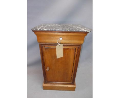 A late 19th century Biedermeier walnut lamp table, with marble top, raised on stepped base, H.71 W.42 D.34cm 