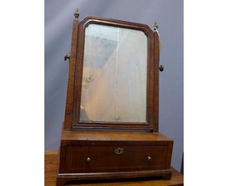 A Georgian mahogany toilet mirror, one drawer, raised on bracket feet, H.53 W.34 D.20cm 