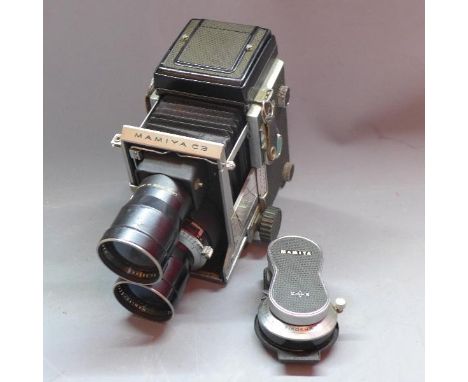 A Mamiya C3 Professional camera, with Mamiya-Sekor 1:4.5 f=18cm lenses, No.975972 and No.848443, and a Mamiya-Sekor 1:2.8 f=8