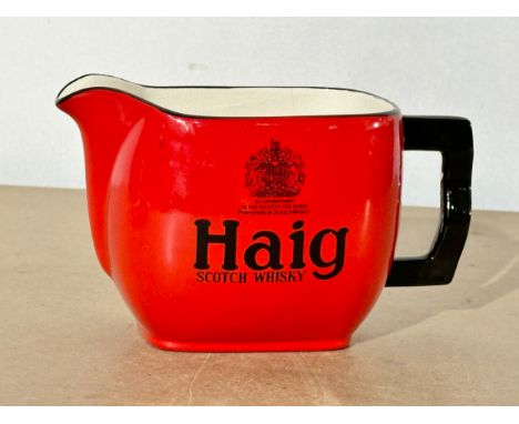 A Haig Scotch Whisky jug. Carlton Ware. 16x9x9cm