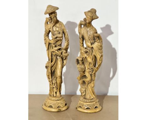 A pair of large Chinese statue figures. 50cm