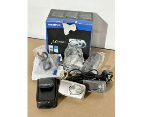 An Olympus U mju U-300 Digital metal body camera. With box and accessories.