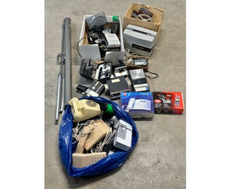 A quantity of vintage electrical. Cameras, phones, projector and screen, car radio etc