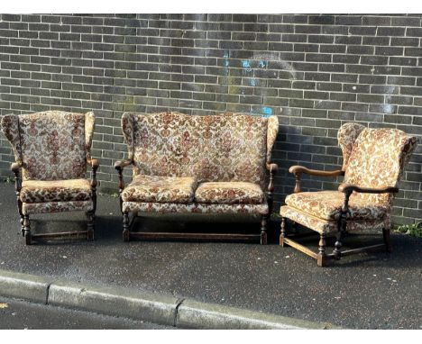 A 3 piece vintage Ercol wingback suite.