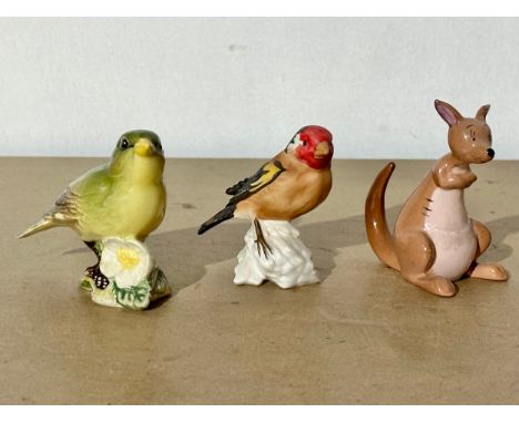 Beswick and Goebel pottery. A Beswick Greenfinch and Walt Disney “Kanga” with a Goebel pottery robin.