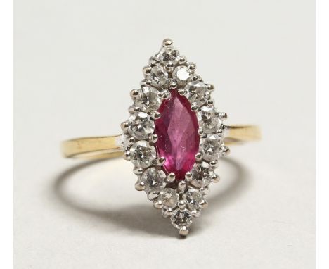 AN 18CT GOLD RUBY AND DIAMOND MARQUISE RING.