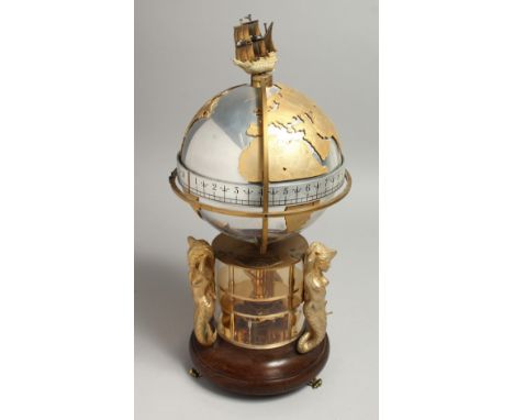 A GOOD ST JAMES HOUSE COMMEMORATIVE ANNULAR CLOCK, circa. 1984, No. 181/1500. The globe revolves, with three gilt mermaid sup