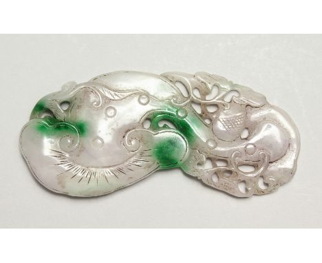 A LARGE TWO-TONE CARVED JADE PENDANT, 12cm long.