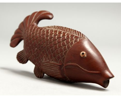 A JAPANESE CARVED WOOD CARP SNUFF BOX Signed.