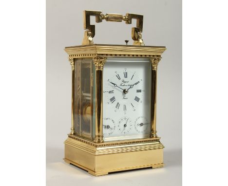 A VERY GOOD FRENCH BRASS CARRIAGE CLOCK, Rapport Fondes, 1900, with four dials, repeat button, column sides. 6ins high.