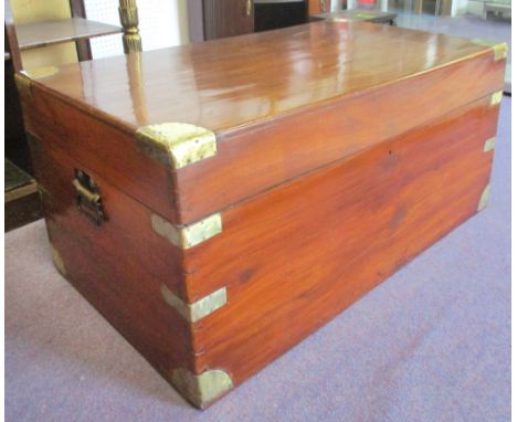 CAMPAIGN TRUNK, 19th century camphorwood and brass bound with rising lid and carrying handles, 45cm H x 104cm x 51cm.