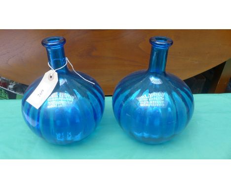 Pair of light blue glass onion shaped flower vases