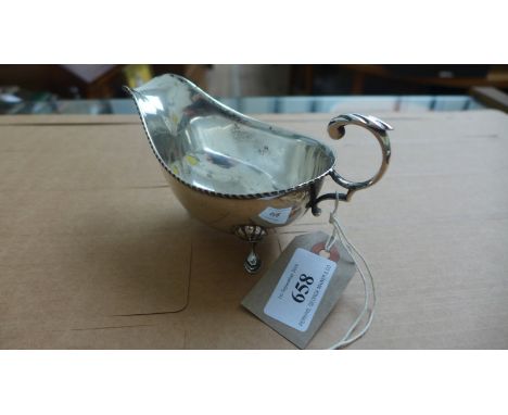 Scroll handled silver sauce boat on 3 spud feet (Sheffield 1935, 4 oz.)