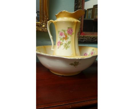 Light brown ground jug and bowl set decorated sprays of pink roses