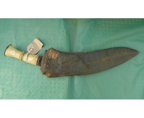 Bone handled Gurkha knife in a leather sheaf