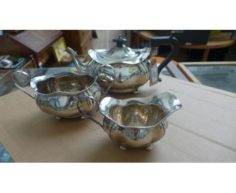 Silver 3 piece tea service with pot with black bean handle to lid and matching handle, double handled sugar basin and milk ju