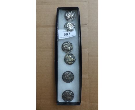 Boxed set of 6 foreign silver buttons each of a garland youth