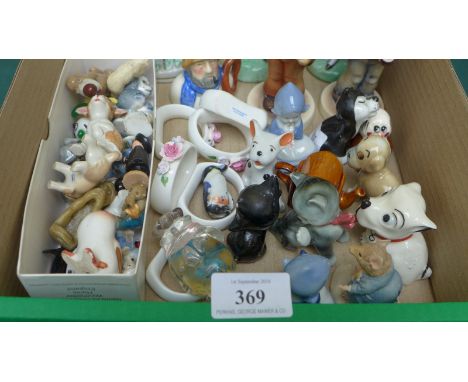Collectors lot of miniature ornaments including Staffordshire flatbacks, pair of Goebel boy musicians, Wade figures etc.