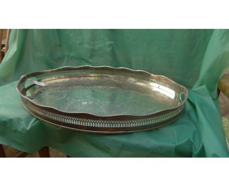 Fine decorative silver plated serving tray with raised pierced gallery (21" x 14") on four bun feet