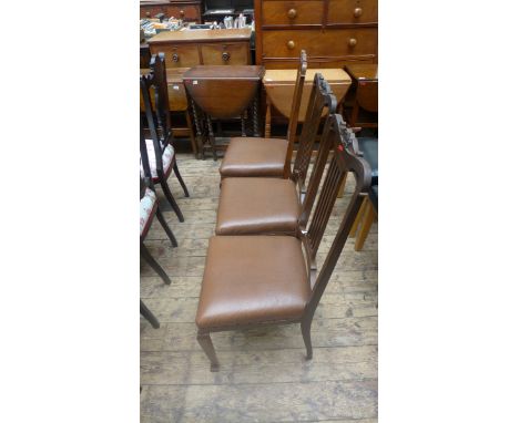 3 carved high backed mahogany framed chairs each with 5 vertical splats to back, the padded seats upholstered in light brown 