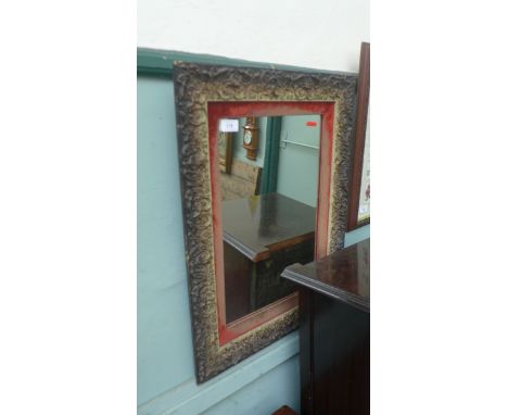 Rectangular Edwardian wall mirror in decorative frame with worn maroon velvet inset surround 