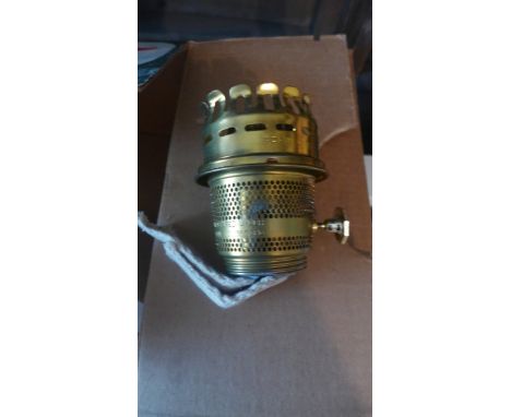 Unassembled boxed mantel brass oil lamp