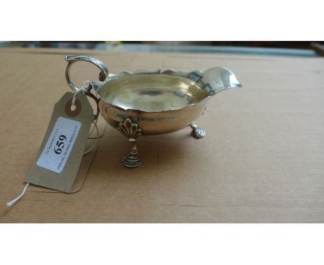 GEORGE II SILVER SAUCE BOAT WITH SCROLLED HANDLE ON 3 SPLAYED CLAW FEET (LONDON 1753, 3 1/2 oz.)