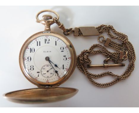 An Elgin Full Hunter Pocket Watch with 25 jewel safety barrel movement, the gold plated case with engine turned and engraved 