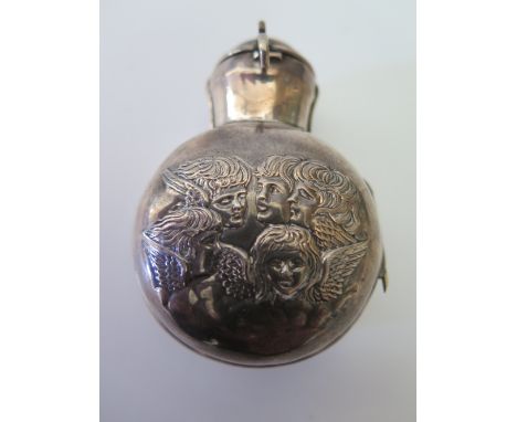 A Victorian Silver Mounted Smelling Salts Flask decorated with putti and with green glass liner, Birmingham or Chester, late 