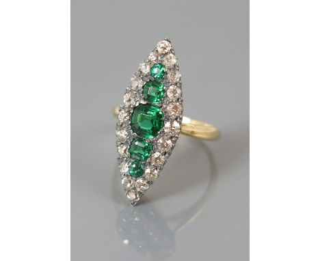 An Emerald and Diamond Marquis Ring, emeralds c. 1.72 ct, size M.5, 6 g