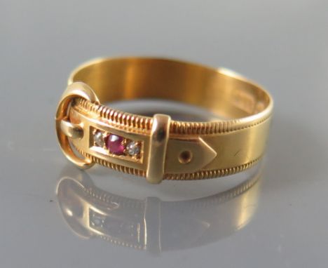 A Victorian 18ct Gold Ruby and Diamond Buckle Ring, Birmingham 1896, size Q.5, 3.5 g