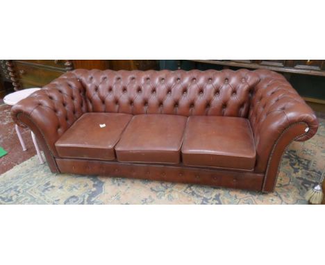 Red leather chesterfield sofa