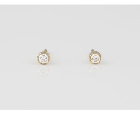 PAAR BRILLANT-OHRSTECKER Gelbgold. Kopf D. ca. 0,3 cm, Ges.-Gew. ca. 0,7 g. Geprüft 14 K. Jeweils ein Brillant, zusammen ca. 